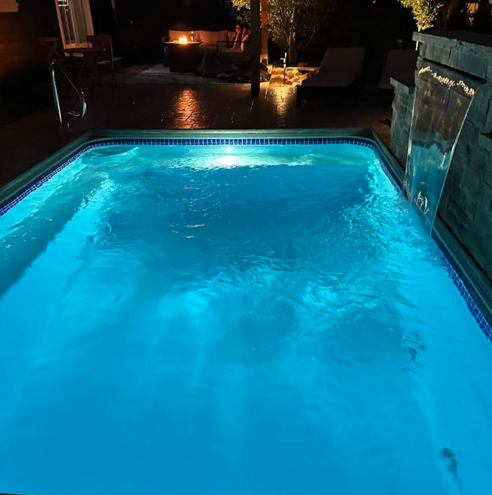 Beautiful spa with crystal clear blue water and ambient lighting